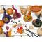 This image shows the elements I use to create the witch hats for my gourd characters. It includes fall foliage and dried botanical berries.